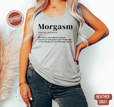 A woman wearing a gray tank top with the word